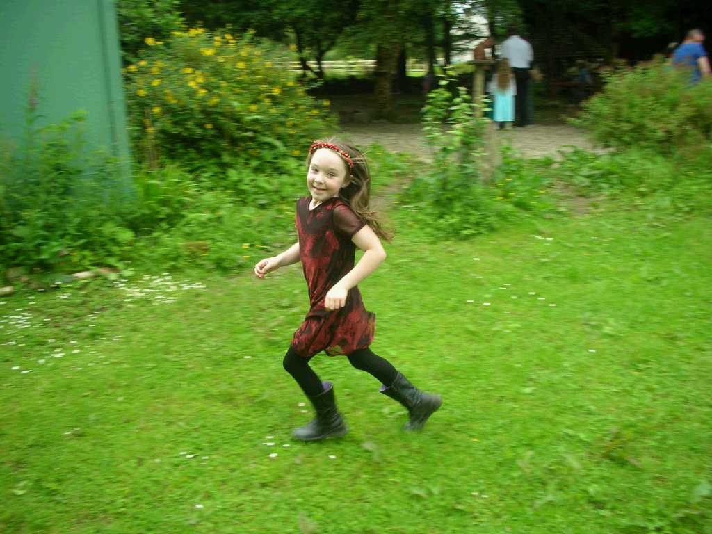 Maria enjoying her Kindergarten grounds for the last time, aged 7