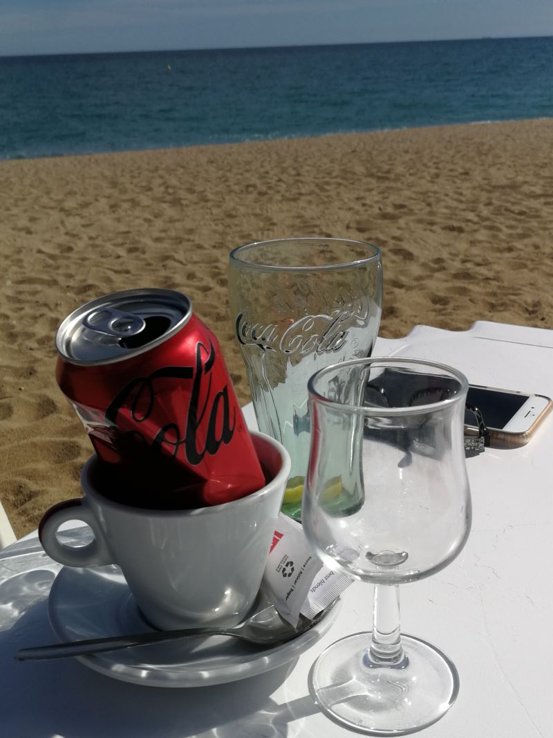 finished drinks at xiringuito on Calella beach