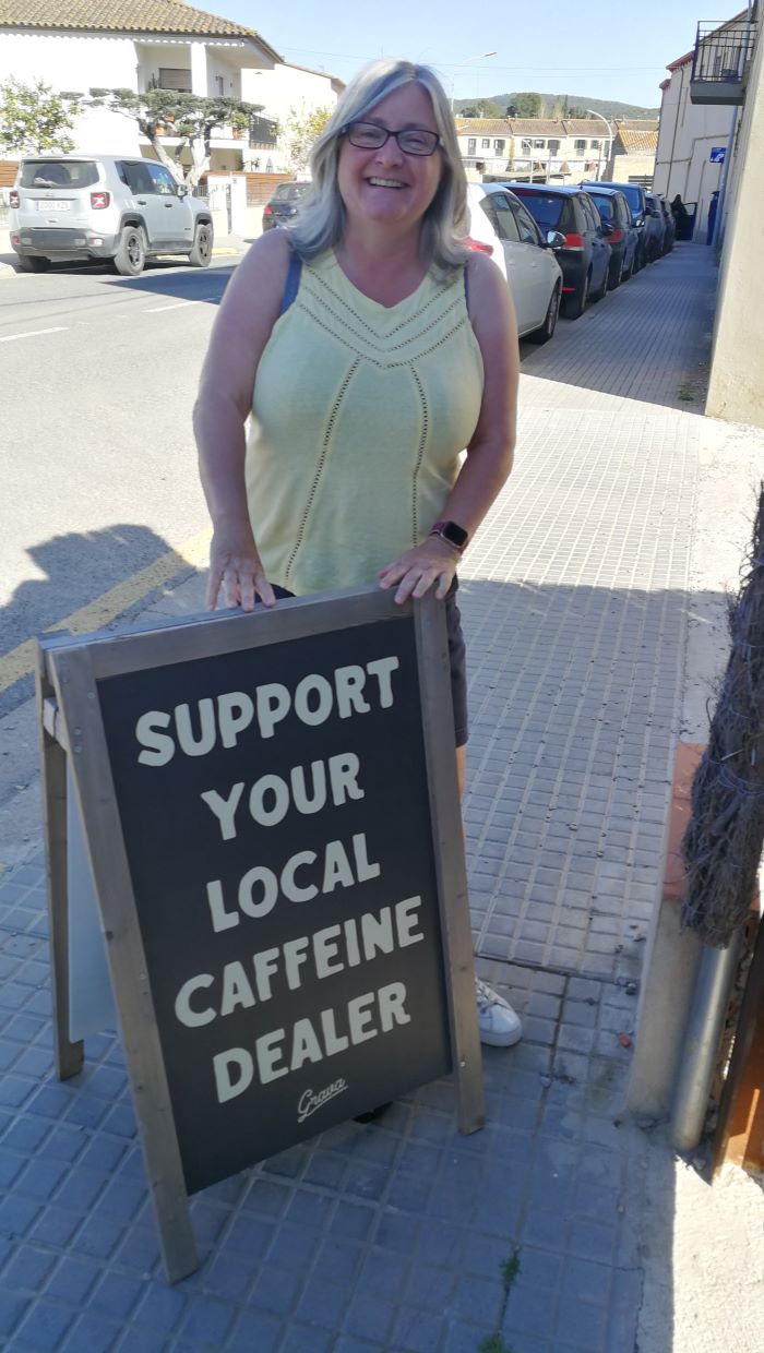 support your local caffeine dealer - a sign at Pals