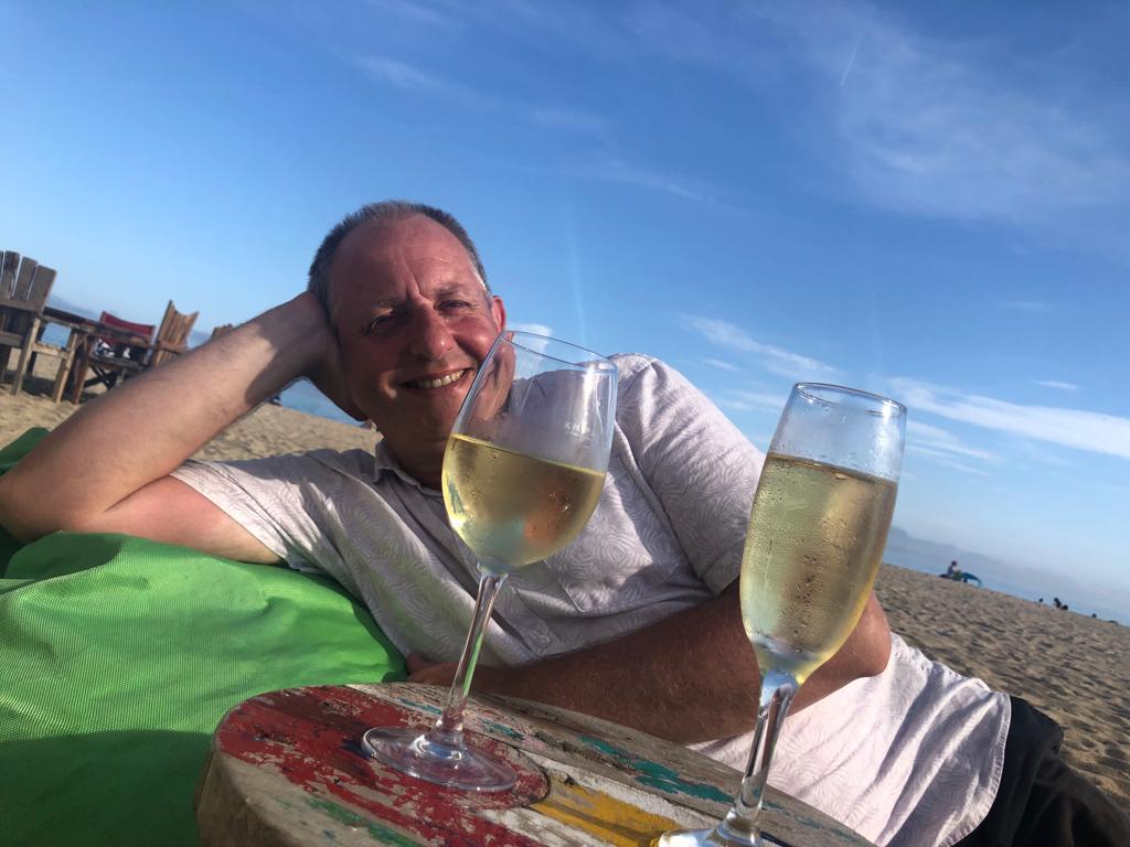 Gerry on the xiringuito beanbag on the beach at Cabrera de Mar