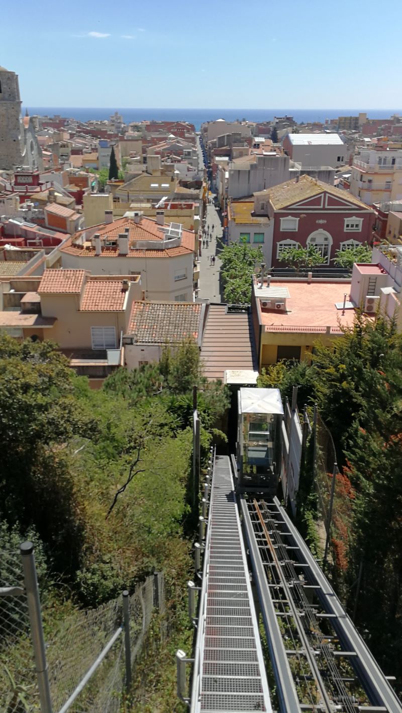 the view down the funicular lift in Malgrat de Mar along Carrer de Mar to the sea